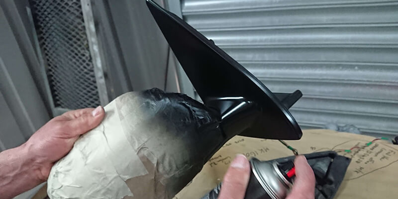 spraying wing mirror