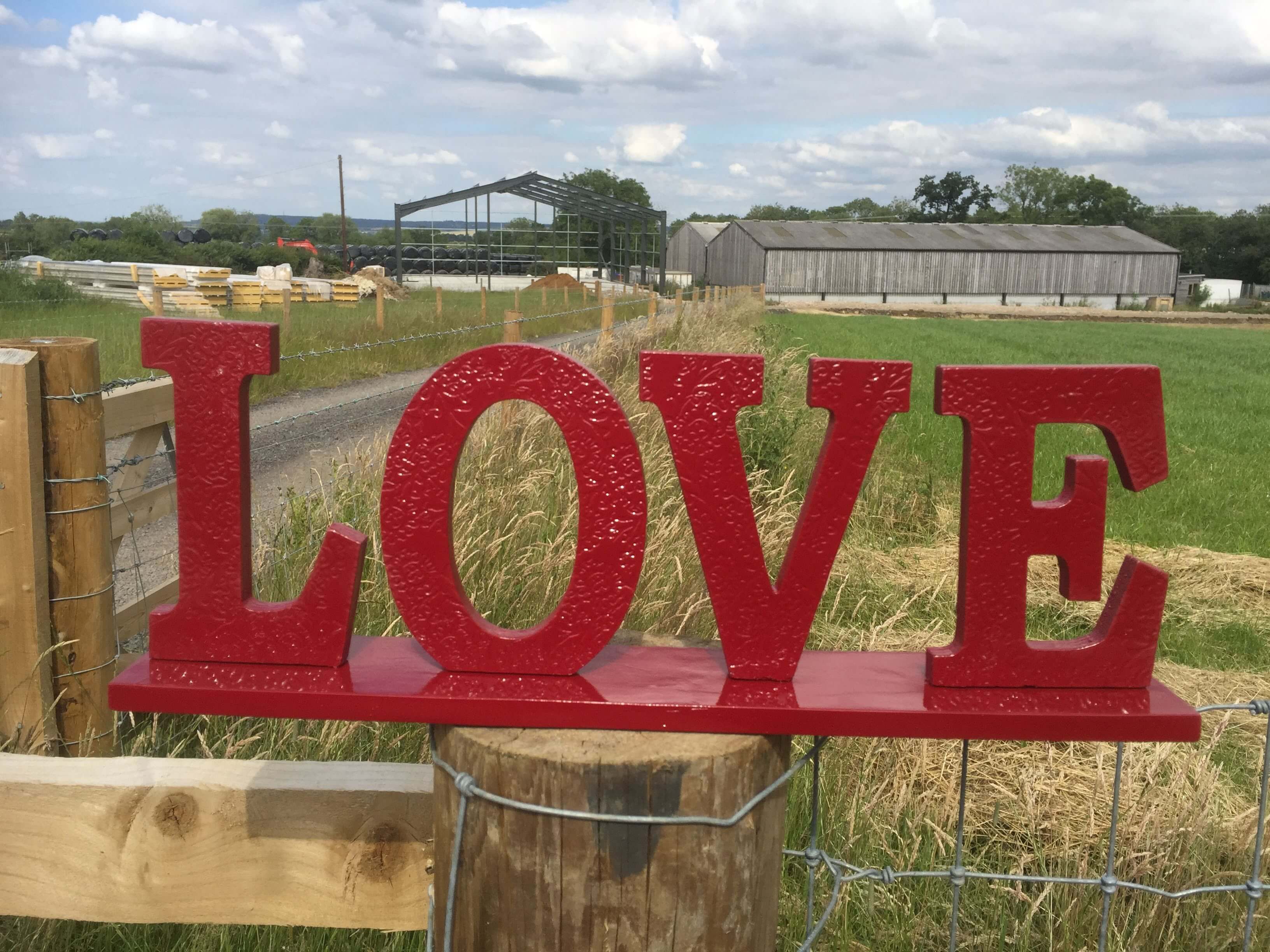 love sign finished painted red