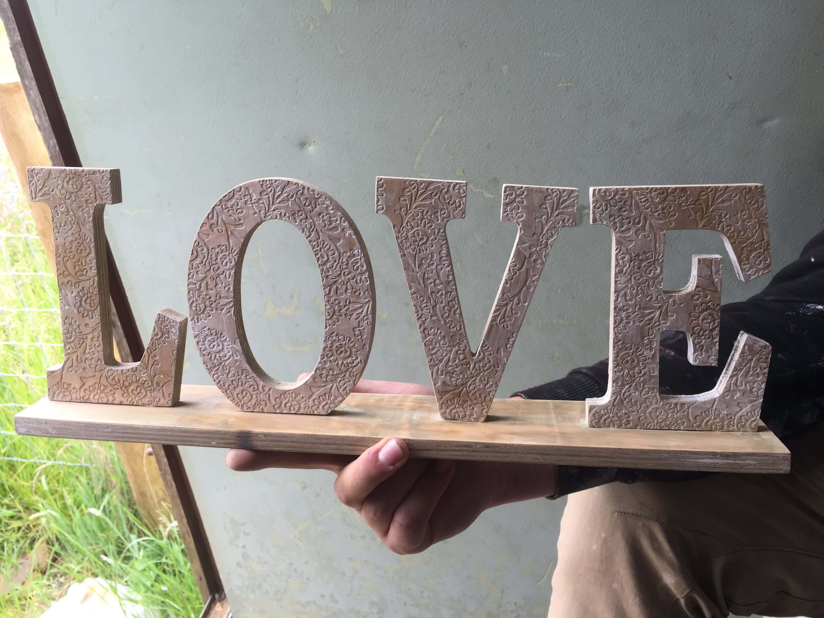 love sign once sanded