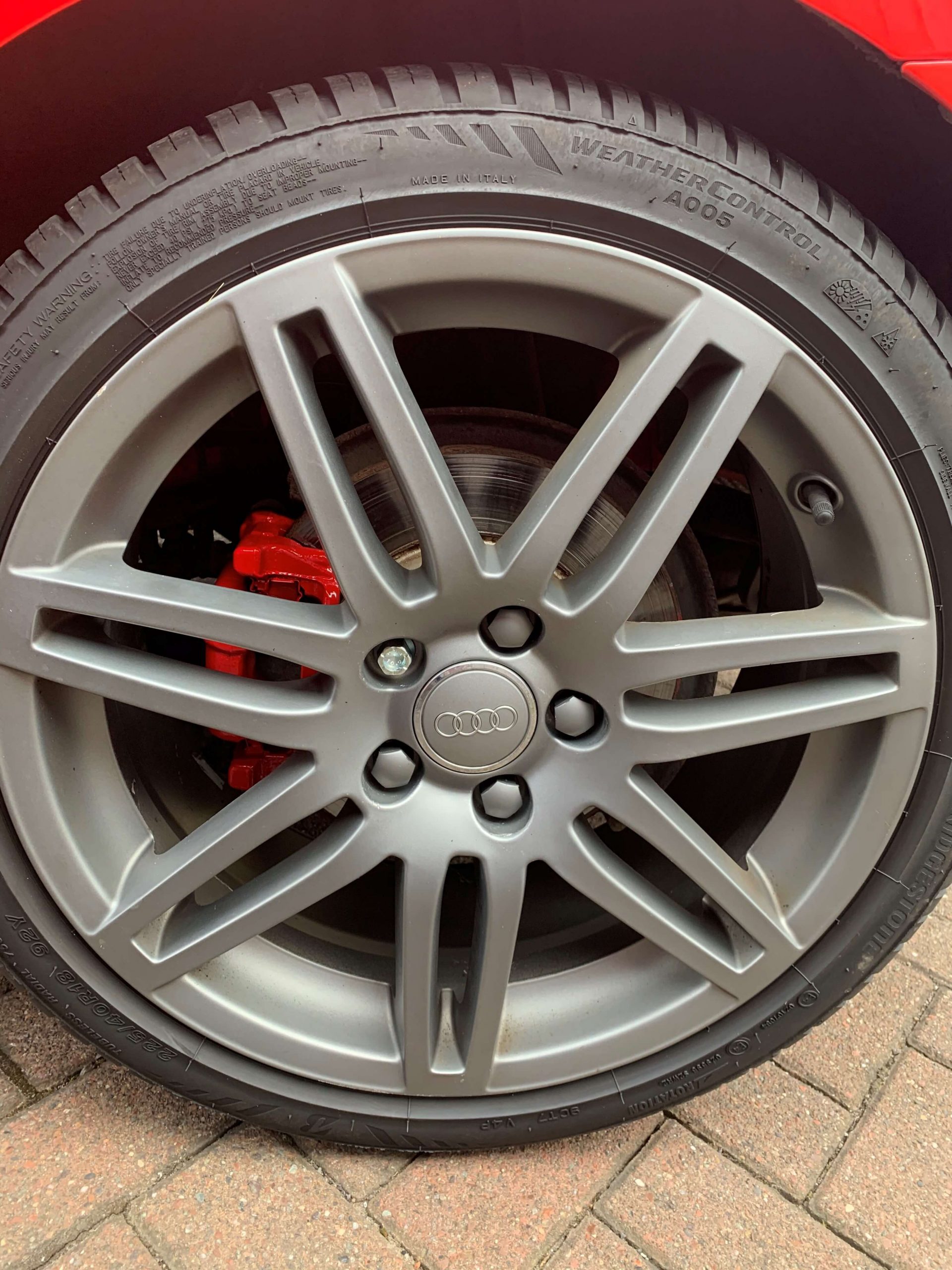 Red Caliper On Car