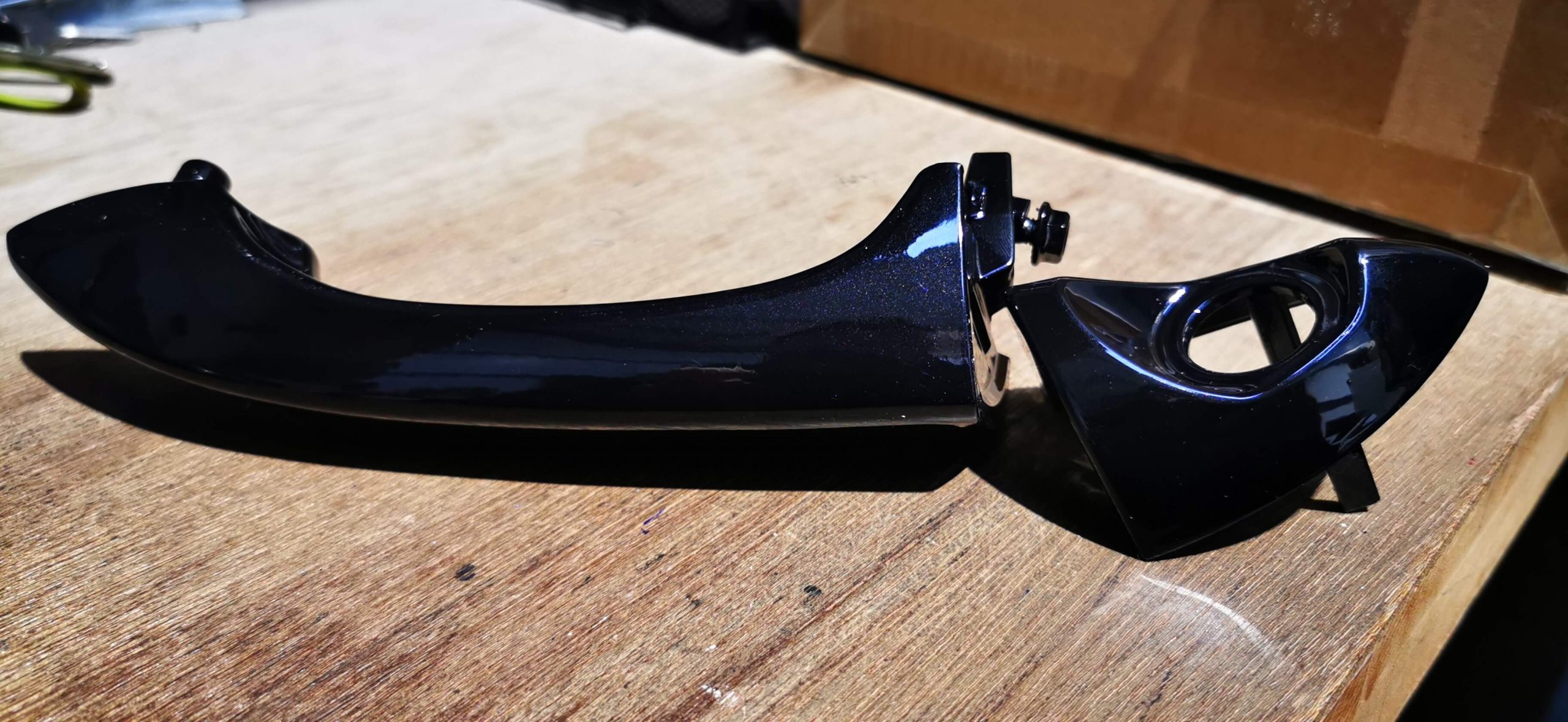 Finished black BMW handle