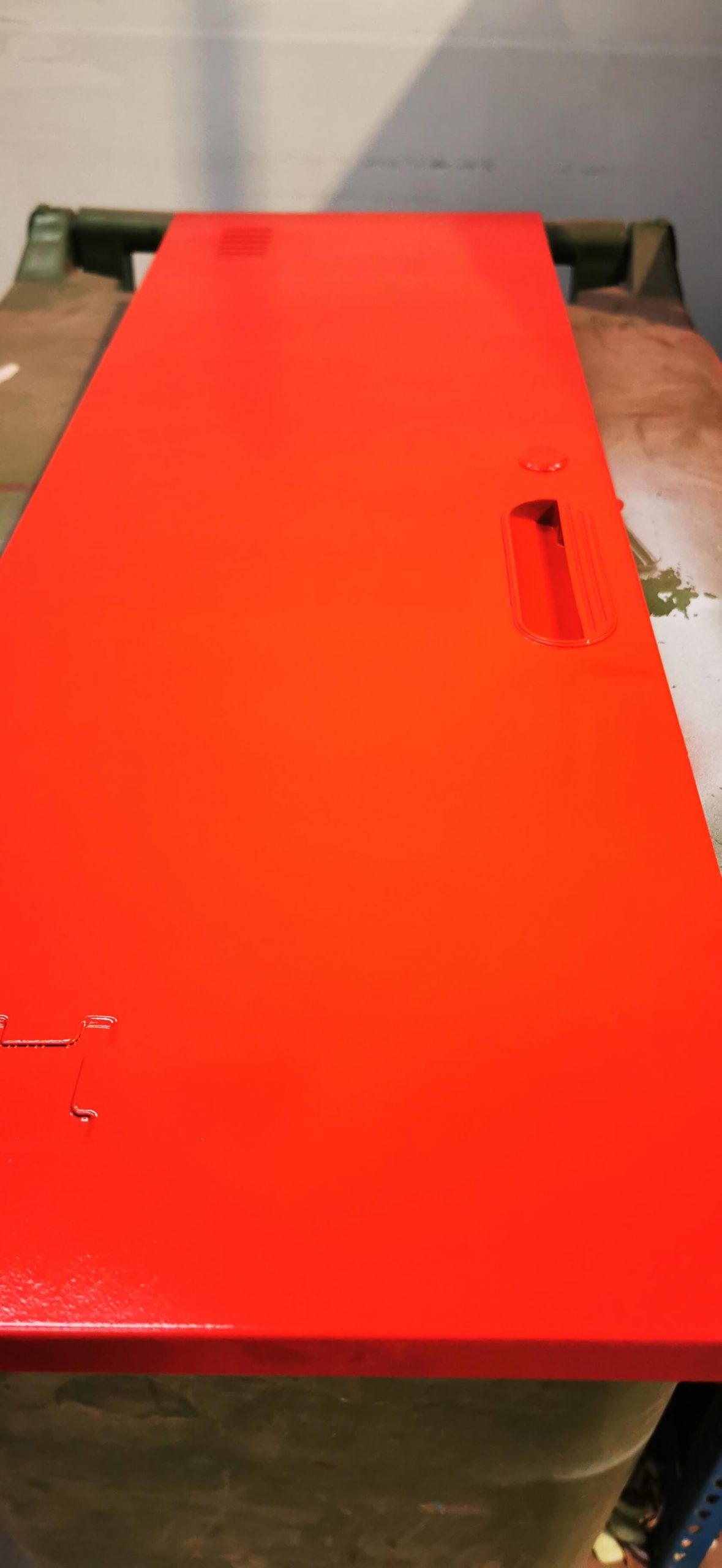 sprayed red locker panel