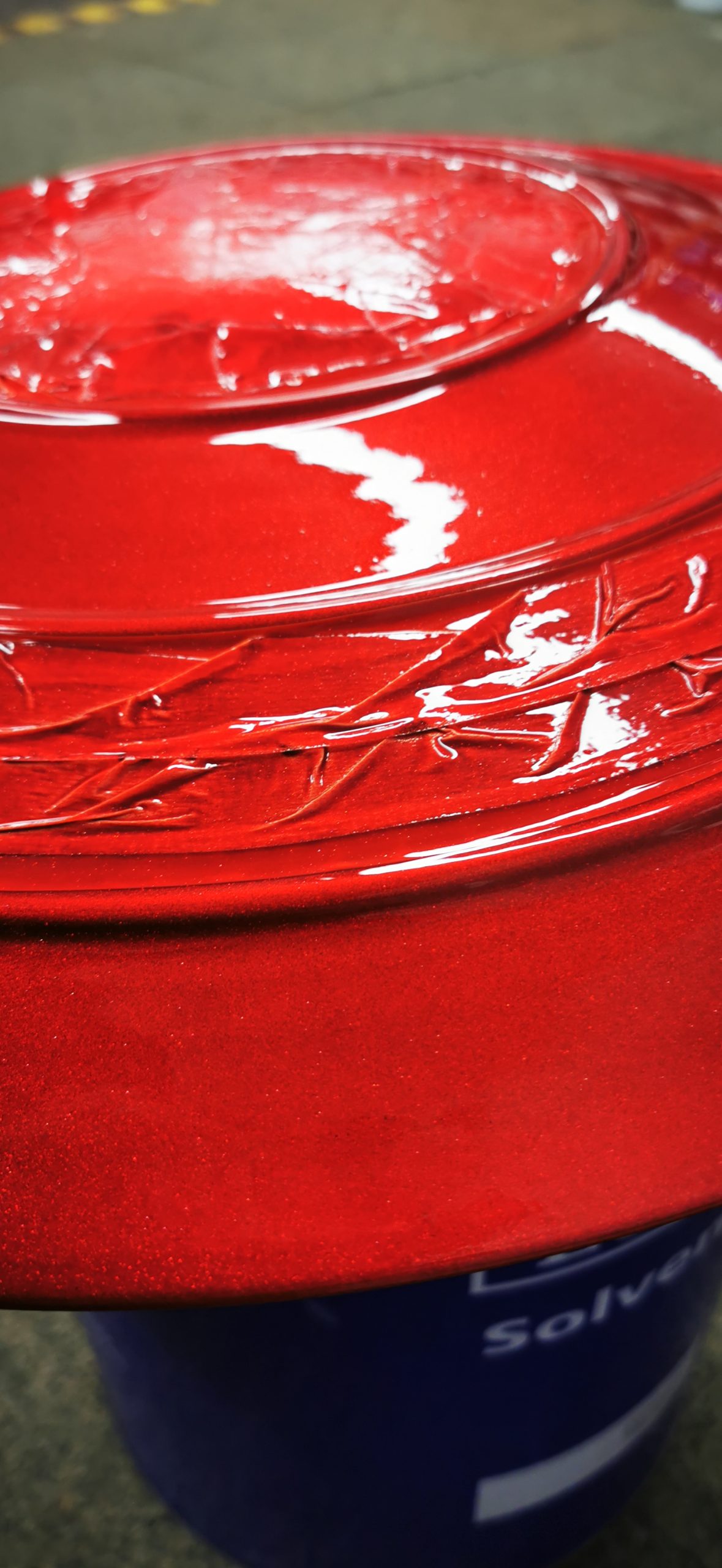 close up of red paint layer