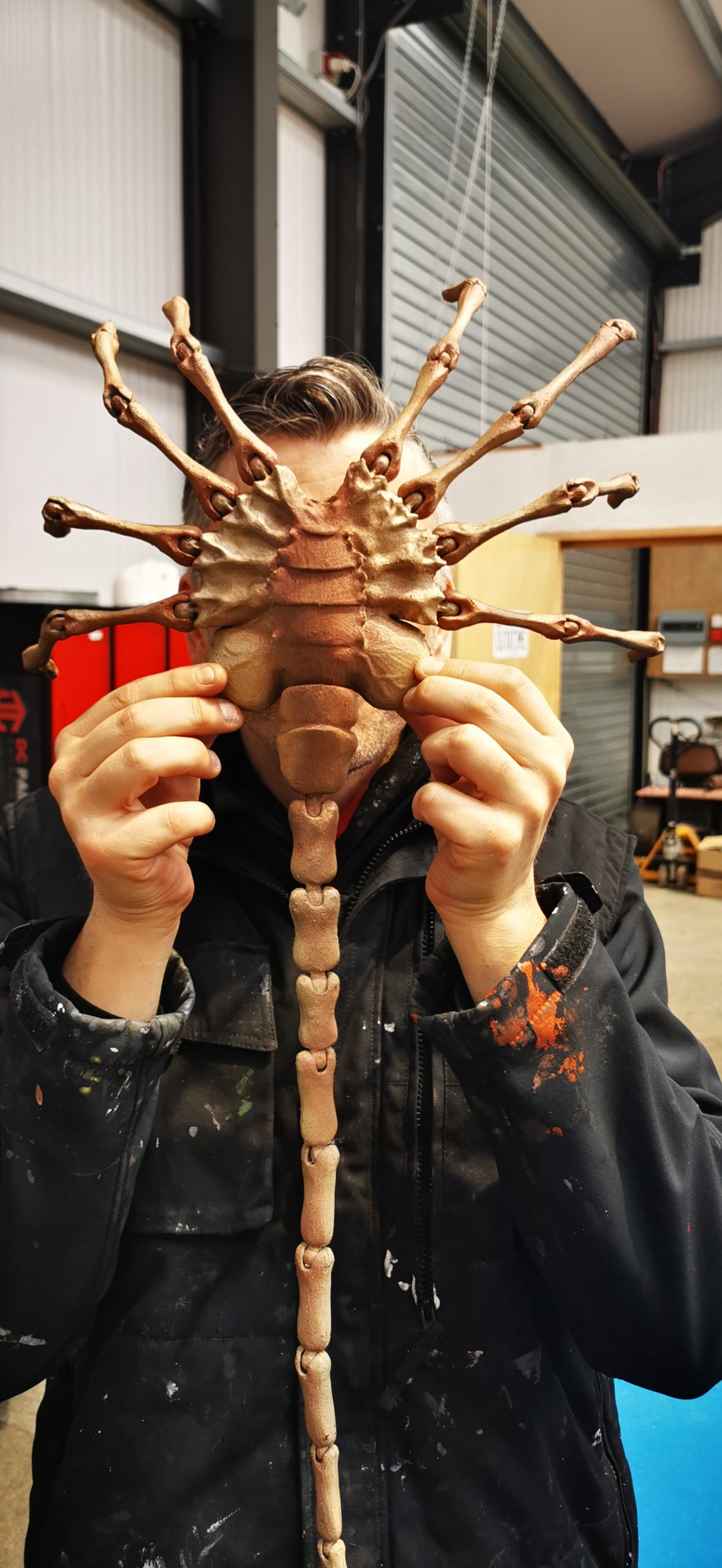 face hugger on team member