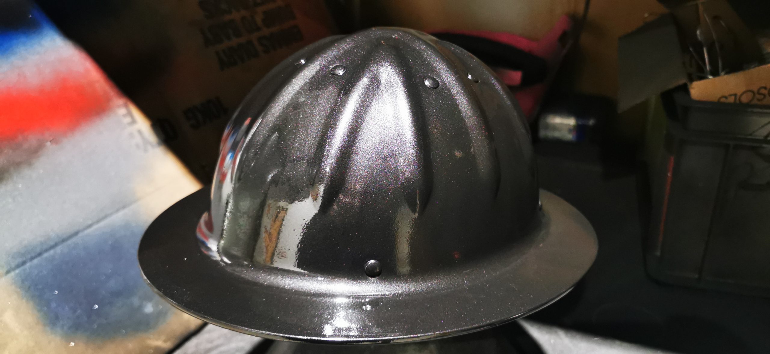 black coating on minors helmet