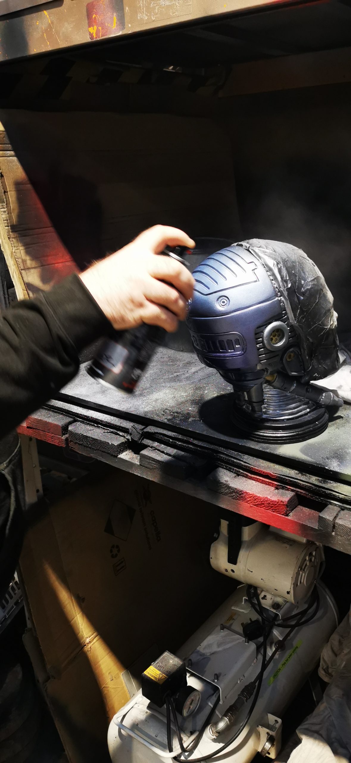 spraying the gloss on robocop