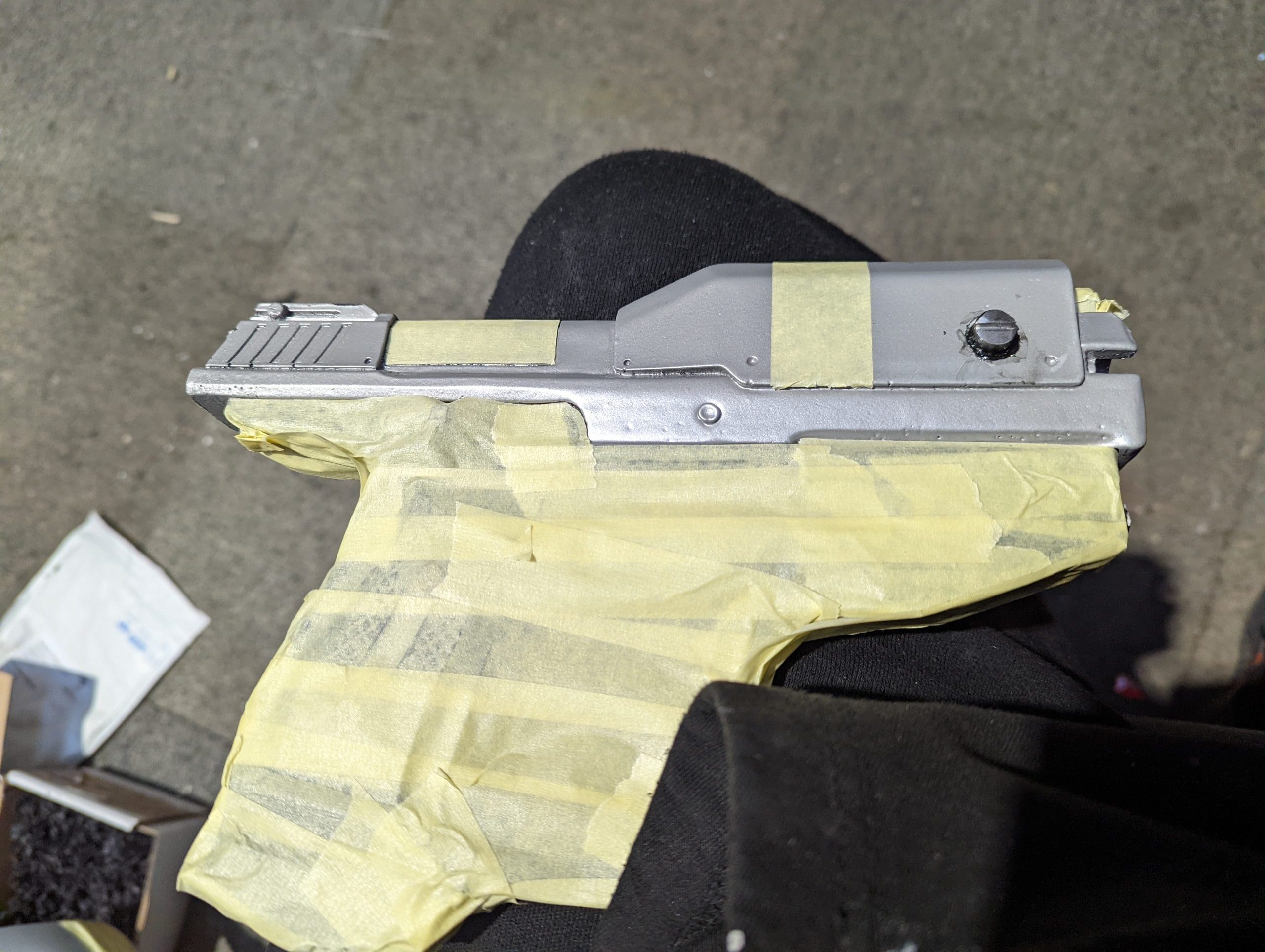 prop gun masked ready for paining