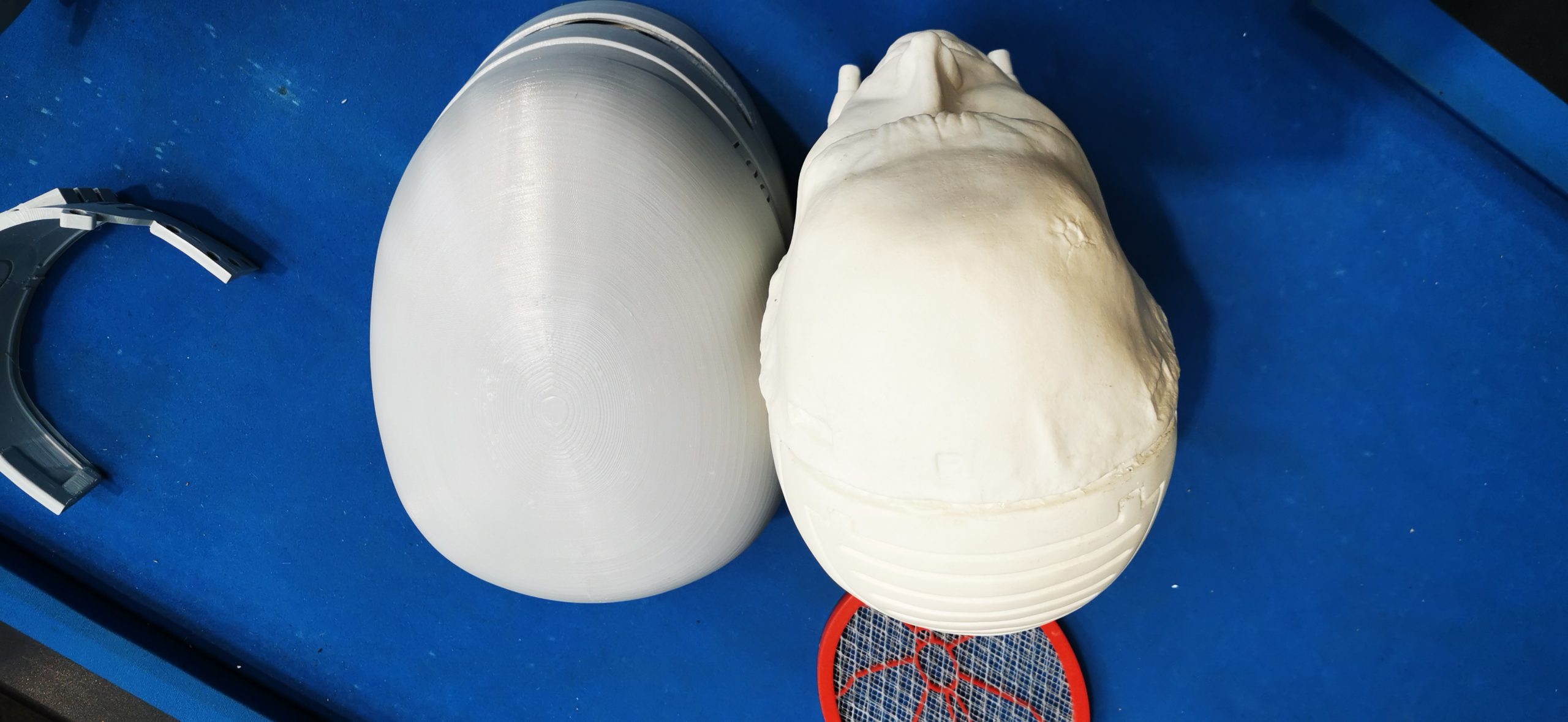 over head view of helmet and robocop head