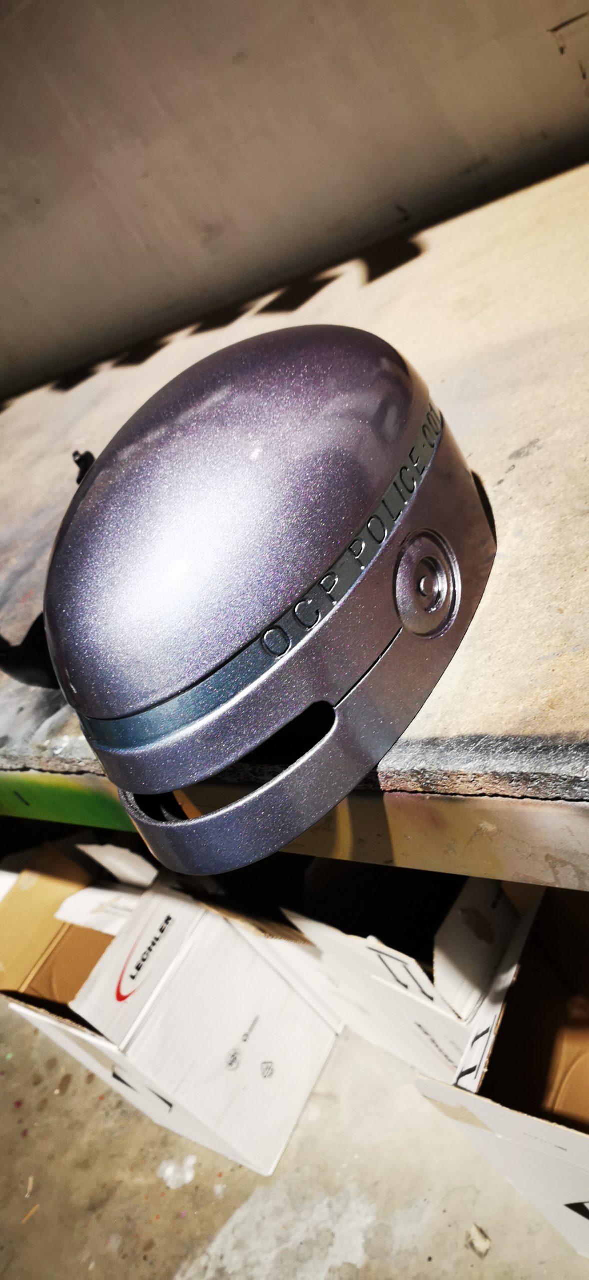 metallic purple paint on helmet