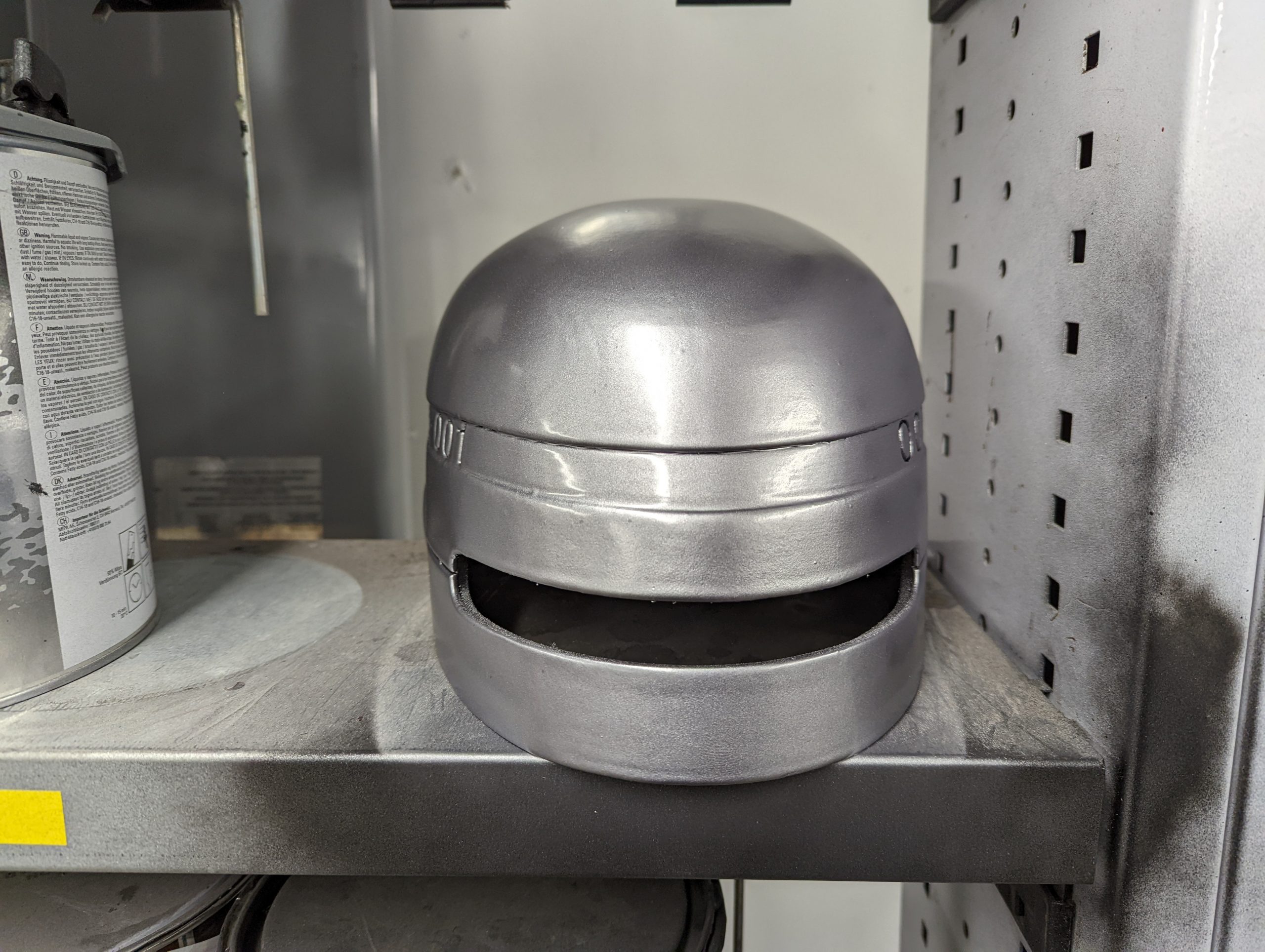 silver painted helmet