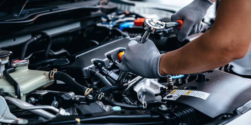 mechanic working on car 1