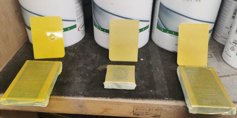Three gold ingots without case