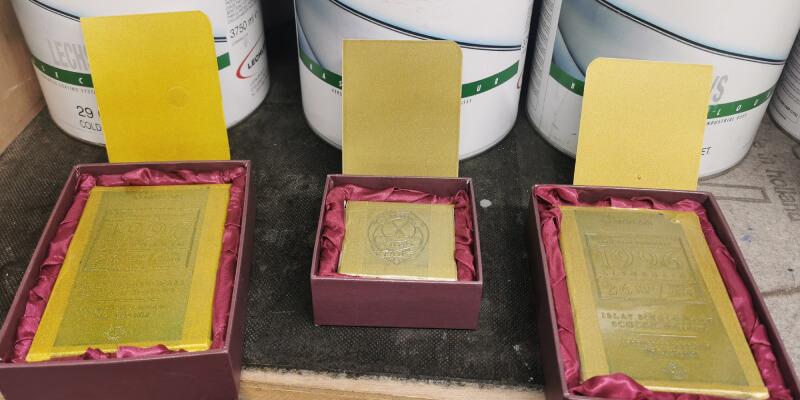 Three gold ingots bright